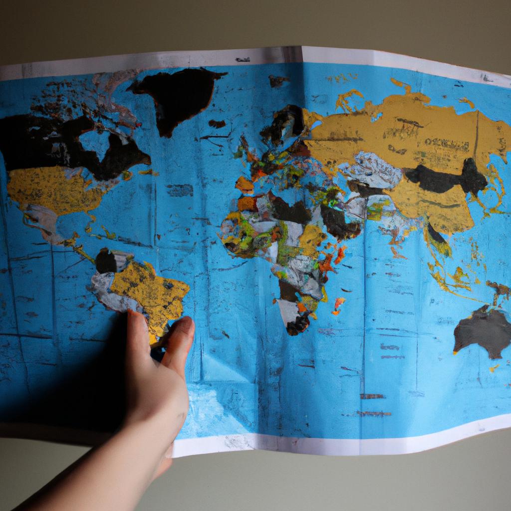 Person holding a world map