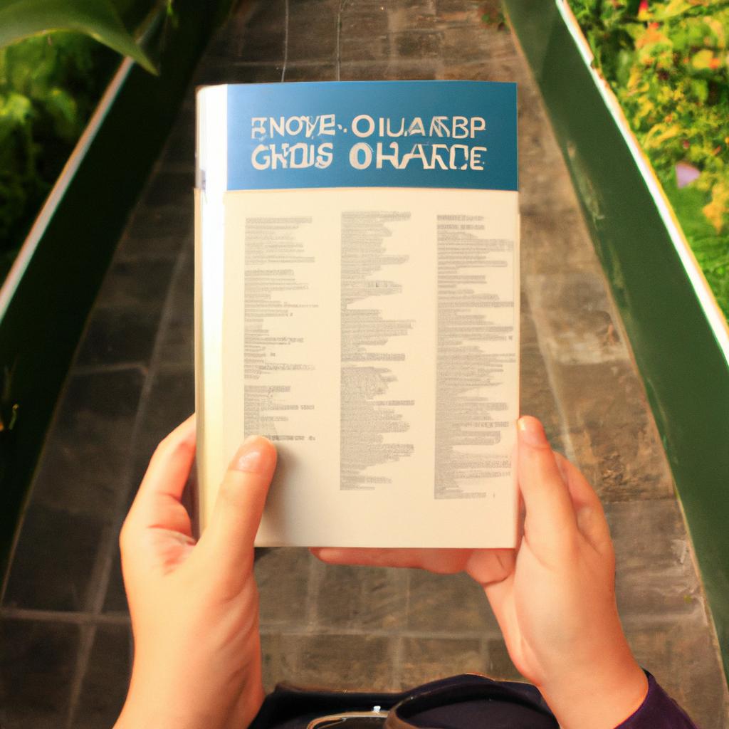 Person holding travel guidebook
