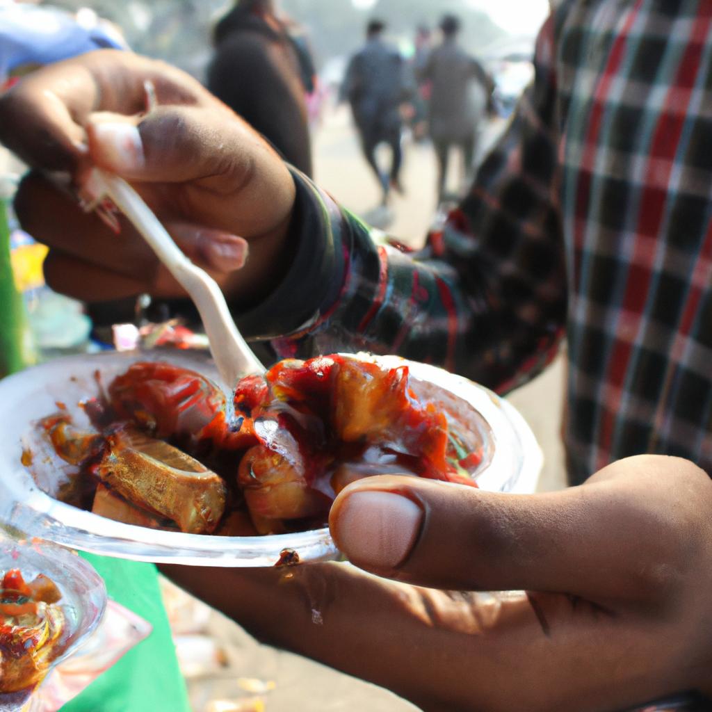 Person enjoying street food delicacies